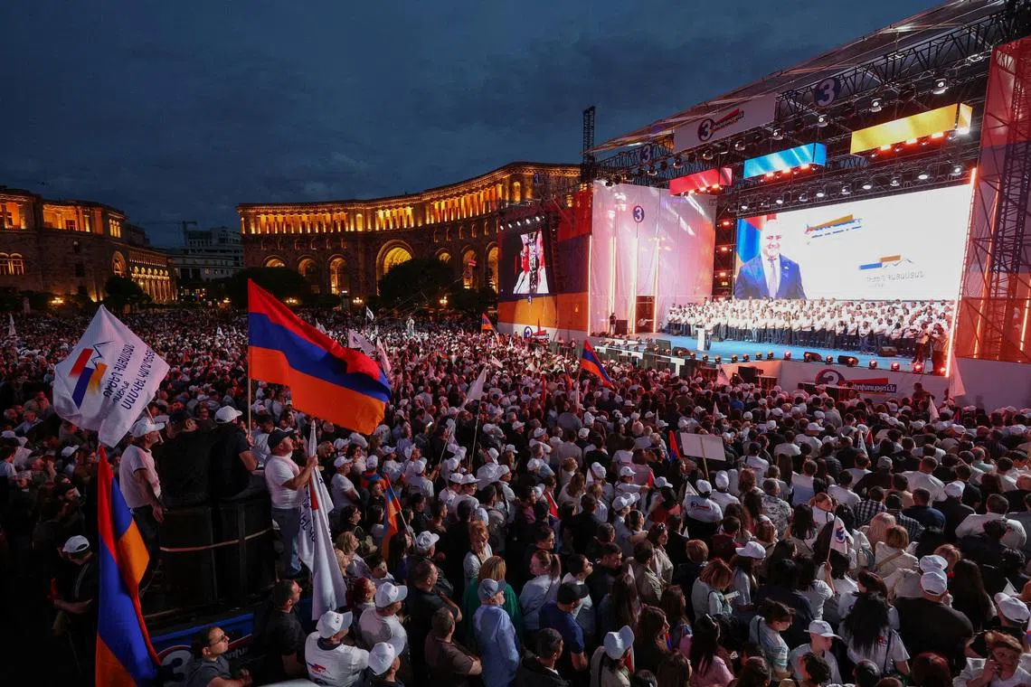 FILE PHOTO: People attend an election campaign rally of the Strong Armenia party, ahead of the June 7 parliamentary election, in Yerevan, Armenia June 3, 2026. Hayk Baghdasaryan/Photolure via REUTERS/File Photo