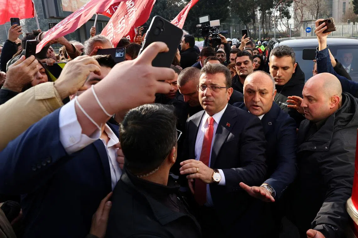 Istanbul Mayor Ekrem Imamoglu, from the main opposition, the Republican People's Party (CHP), walks after giving testimony to judicial authorities at the Justice Palace, known as Caglayan Courthouse, in Istanbul, Turkey, January 31, 2025. REUTERS/Umit Bektas/File Photo
