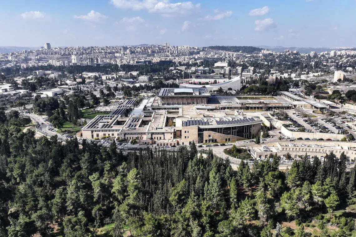 FILE PHOTO: A drone view of Jerusalem with the Knesset, the Israeli parliament, in Jerusalem February 17, 2025. REUTERS/Ilan Rosenberg/File photo