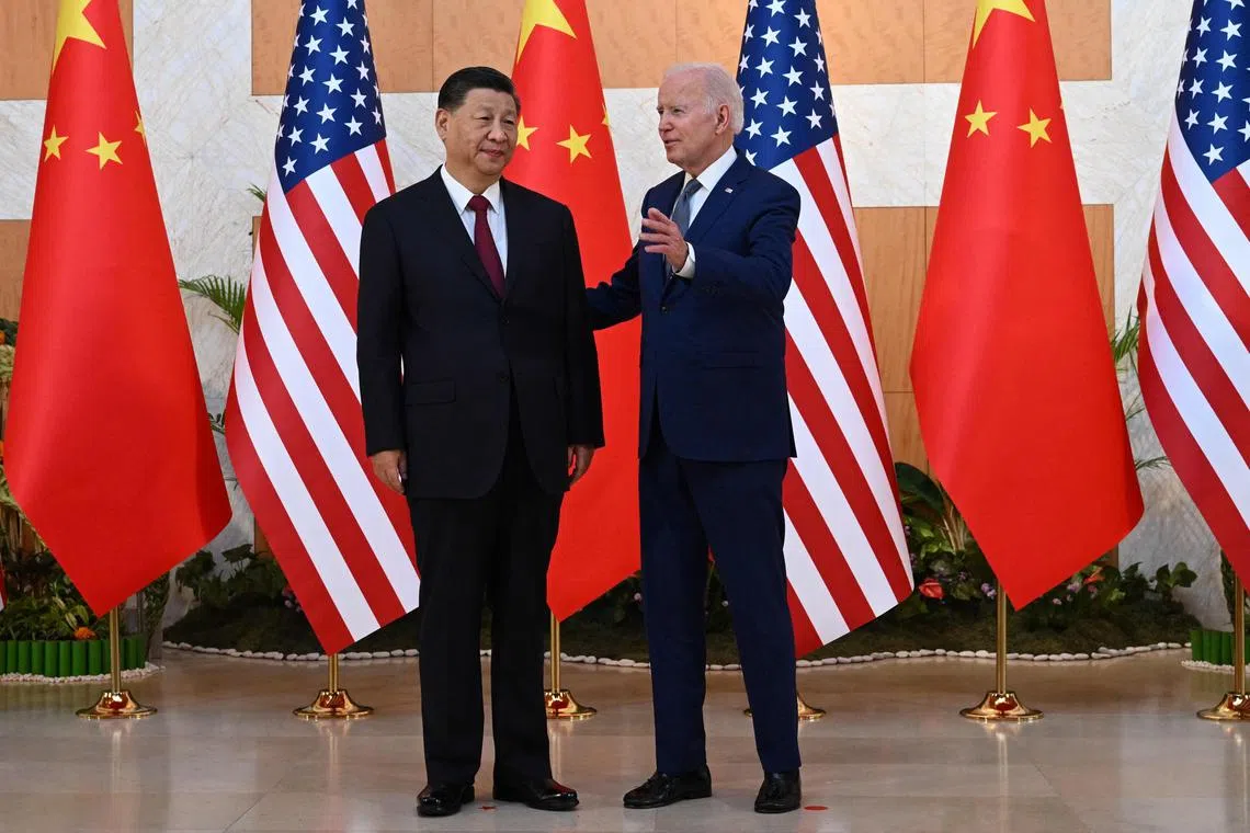 US President Joe Biden (R) and Chinese President Xi Jinping hold a meeting on the sidelines of the recent G20 Summit in Nusa Dua on the Indonesian resort island of Bali. Pentagon's recent report highlights the increased threat posed by China.