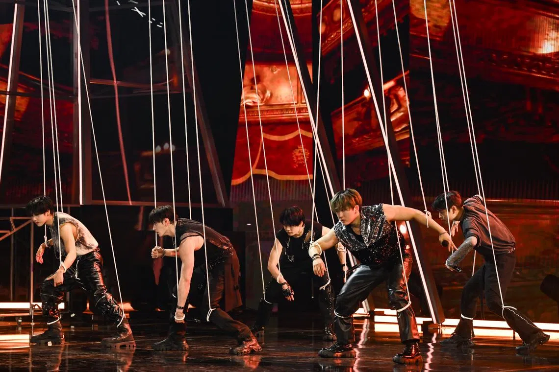 K-pop boy band Stray Kids (from left) Han, Bang Chan, I.N, Changbin and Seungmin recreated the marionette-inspired introduction of NSync's Bye Bye Bye.