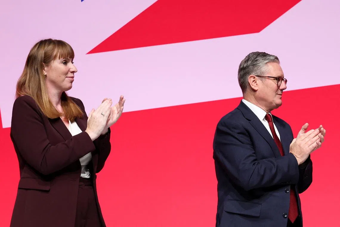 British Deputy Prime Minister Angela Rayner and Prime Minister Keir Starmer applaud at Britain's Labour Party's annual conference in Liverpool, Britain, September 23, 2024. REUTERS/Phil Noble