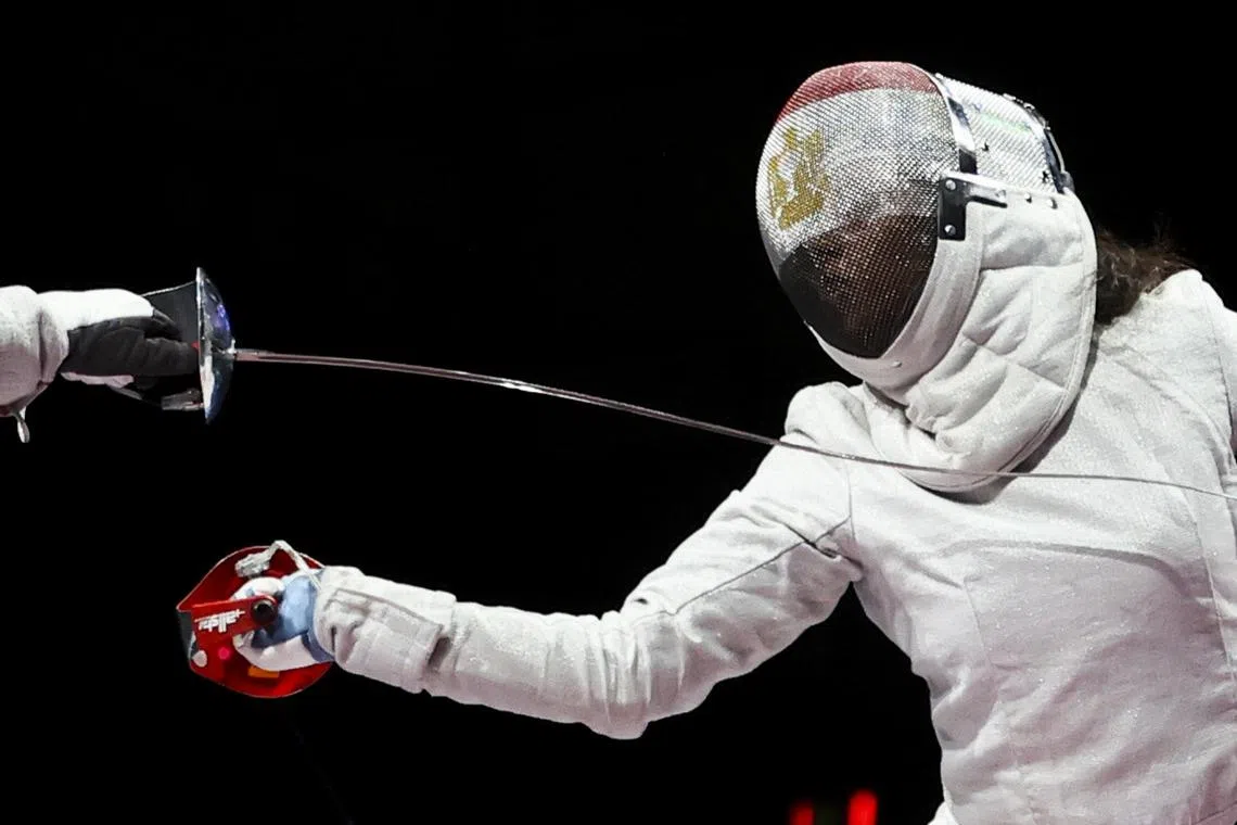 Tokyo 2020 Olympics - Fencing - Women's Individual Sabre - Last 32 - Makuhari Messe Hall B - Chiba, Japan - July 26, 2021. Nada Hafez of Egypt in action REUTERS/Maxim Shemetov