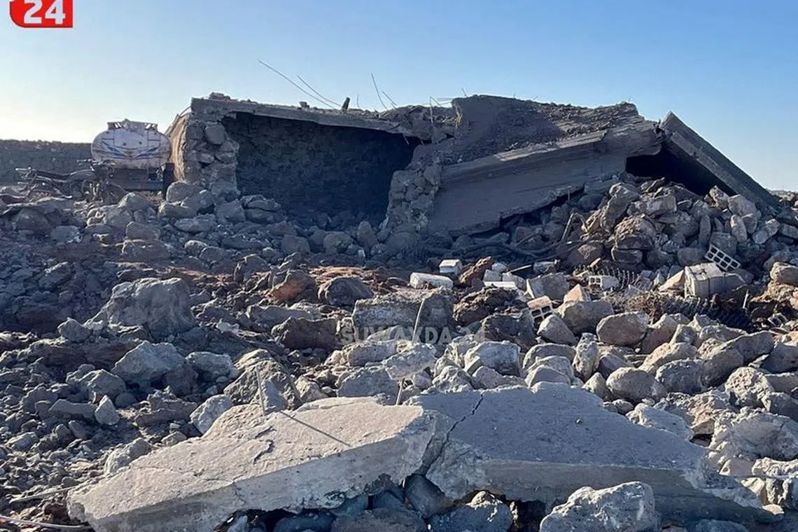 Rubble from a destroyed building lies in the aftermath of a suspected Jordanian airstrike on what is given as Sweida, Syria, in this picture obtained from social media released January 18, 2024. Suwayda 24 via REUTERS/File Photo