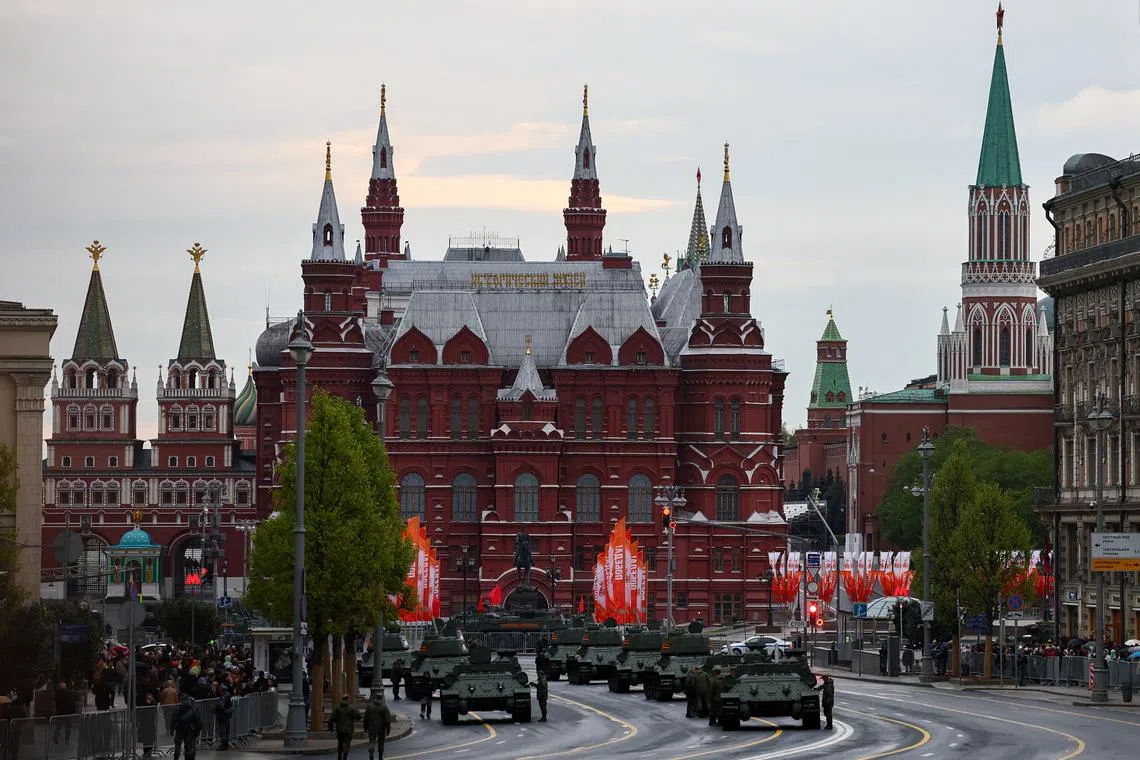 FILE PHOTO: T-34 Soviet-era tanks are seen in a street near near the State Historical Museum and the Kremlin wall on the day of a rehearsal for a military parade, which marks the 80th anniversary of the victory over Nazi Germany in World War Two, in central Moscow, Russia, April 29, 2025. REUTERS/Evgenia Novozhenina