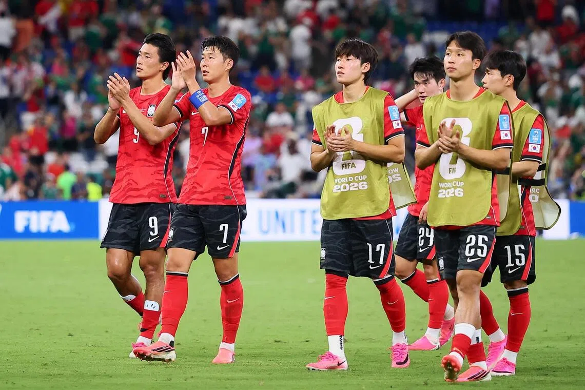 South Korean players applaud their fans after the World Cup match against South Africa in June.
