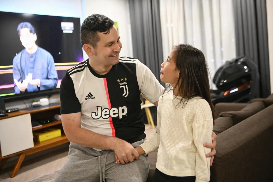 Mr Muhd Iruan Karaman, 46, Cyber Security Specialist (dad) with his daughter, Nur Sarah Alia Muhd Iruan, 11 (white top) 



/Do parents need to apologise to their kids? Aren't parents always right? Experts say the act of saying sorry helps the family build a stronger relationship, but be careful not to overdo it. 
Please take photo of this couple with their 5 kids aged 9 to 17. Beside the usual happy family portraits, please ask them to role-play. Either the mum Siti Noraisyah or dad Muhammad Iruan can hold their fourth child Sarah Alia's hand and say sorry to her, while the rest look on with a smile.