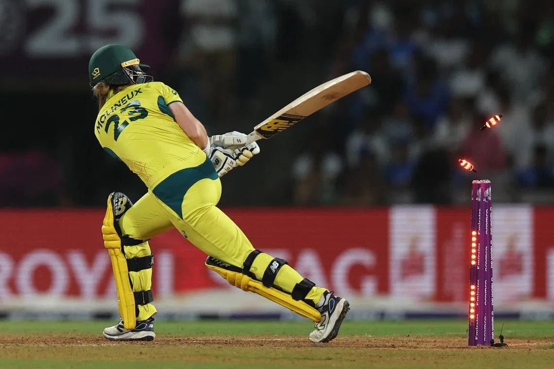 Cricket - ICC Women's World Cup - Semi Final - India v Australia - DY Patil Stadium, Navi Mumbai, India - October 30, 2025 Australia's Sophie Molineux gets bowled out by India's Deepti Sharma REUTERS/Francis Mascarenhas