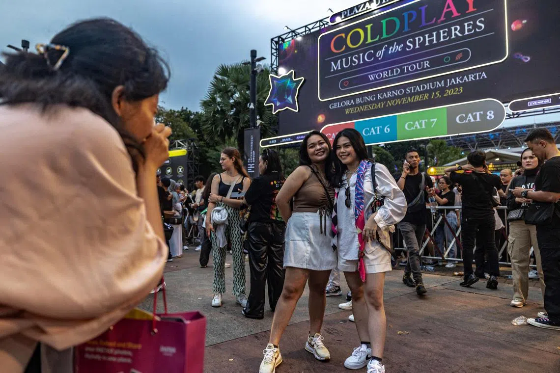 Fans of British rock band Coldplay at the entrance of the Gelora Bung Karno Stadium in Jakarta, Indonesia, on Nov 15, 2023.