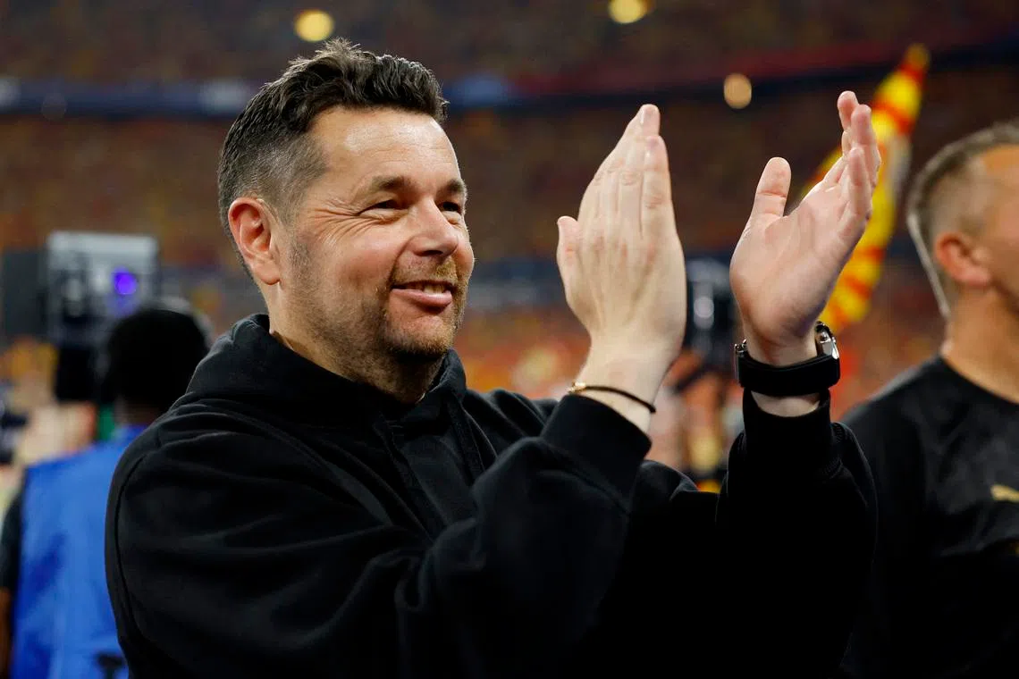 Pierre Sage celebrates after winning the Coupe de France with French club RC Lens in May.