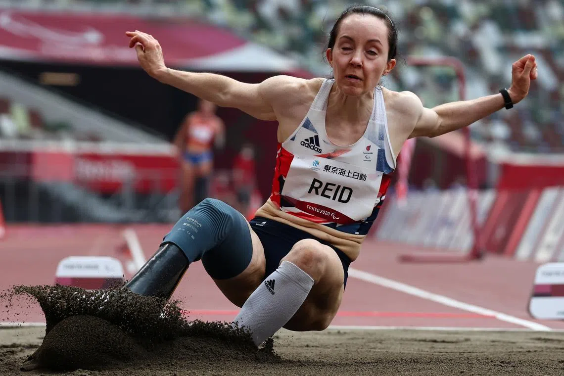 FILE PHOTO: Tokyo 2020 Paralympic Games - Athletics - Women's Long Jump - T64 Final - Olympic Stadium, Tokyo, Japan - August 28, 2021. Stef Reid of Britain in action REUTERS/Athit Perawongmetha/File Photo
