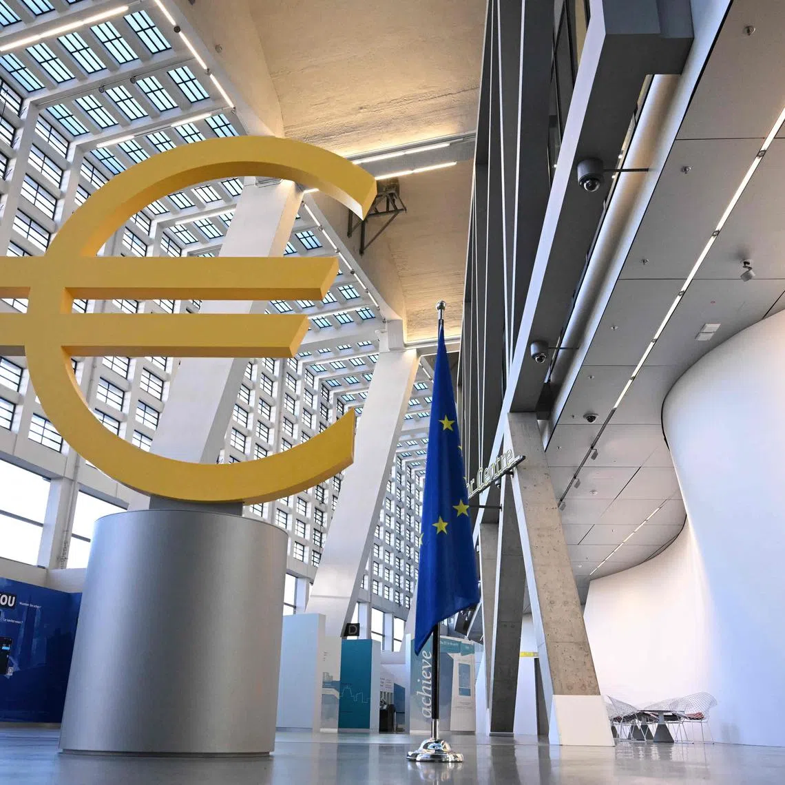 A giant Euro sculpture is pictured at the headquarters of the European Central Bank (ECB) prior to a press conference on the Eurozone's monetary policy in Frankfurt am Main, western Germany, on January 30, 2025. (Photo by Kirill KUDRYAVTSEV / AFP)