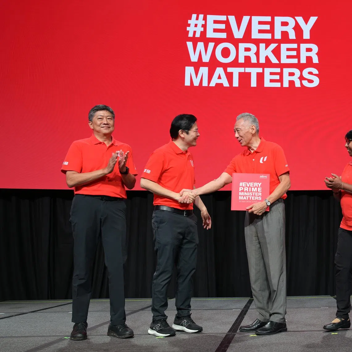 (From left) NTUC secretary-general Ng Chee Meng, DPM Lawrence Wong, PM Lee Hsien Loong and NTUC president K. Thanaletchimi at the annual May Day Rally on May 1.