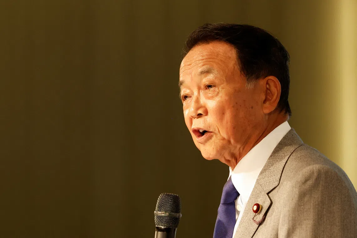 Japan's Former Prime Minister and current Vice-President of the ruling Liberal Democratic Party, Taro Aso, speaks during the Ketagalan Forum in Taipei, Taiwan August 8, 2023. REUTERS/Carlos Garcia Rawlins