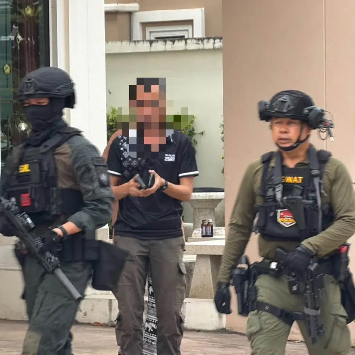 The police had surrounded the house after the shooting late on the morning of Sept 9.