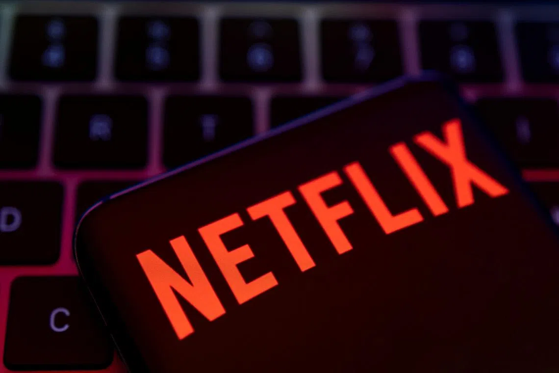 FILE PHOTO: Smartphone with Netflix logo is placed on a keyboard in this illustration taken April 19, 2022. REUTERS/Dado Ruvic