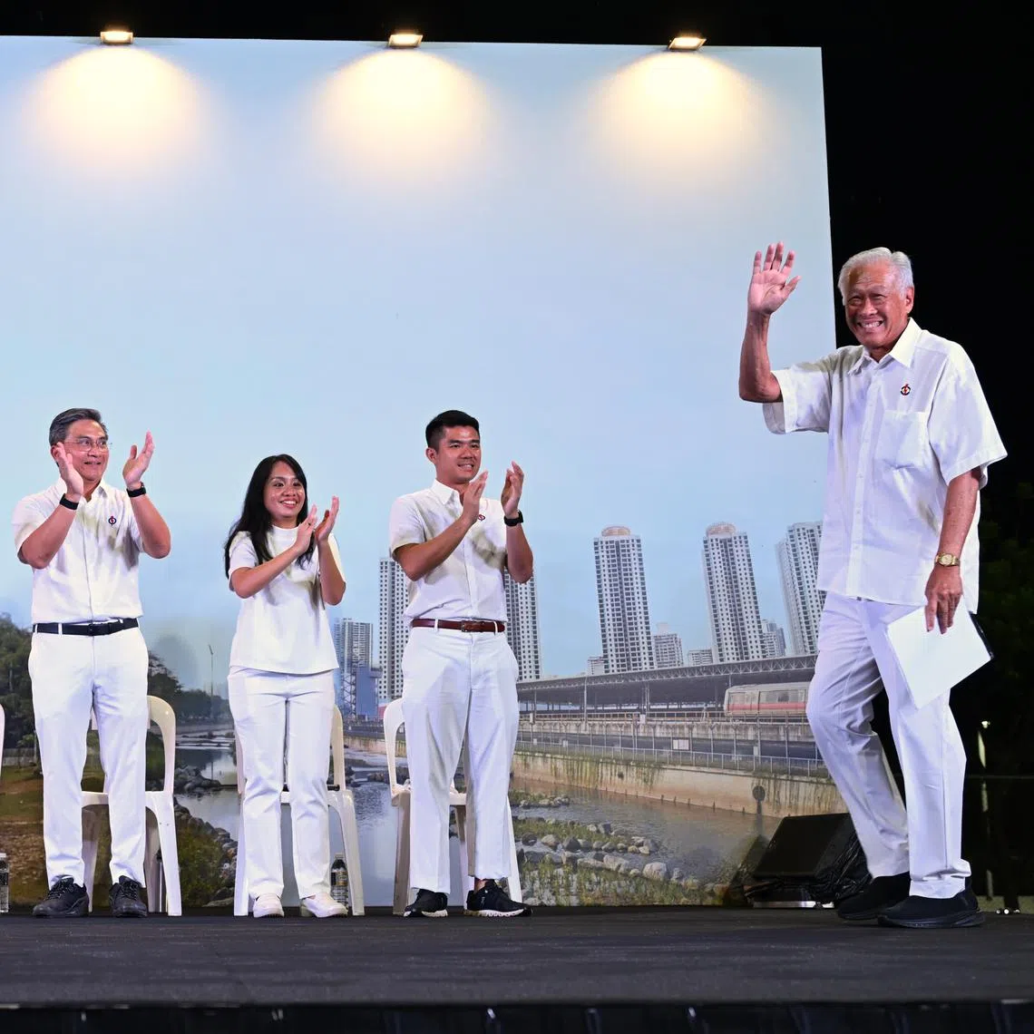 Defence Minister Ng Eng Hen at the PAP rally at Bishan Stadium on April 30. With him are (from left) anchor minister for Bishan-Toa Payoh GRC Chee Hong Tat, Marymount SMC incumbent MP Gan Siow Huang, and the other members of the Bishan-Toa Payoh GRC slate –Mr Saktiandi Supaat, Ms Elysa Chen and Mr Cai Yinzhou.