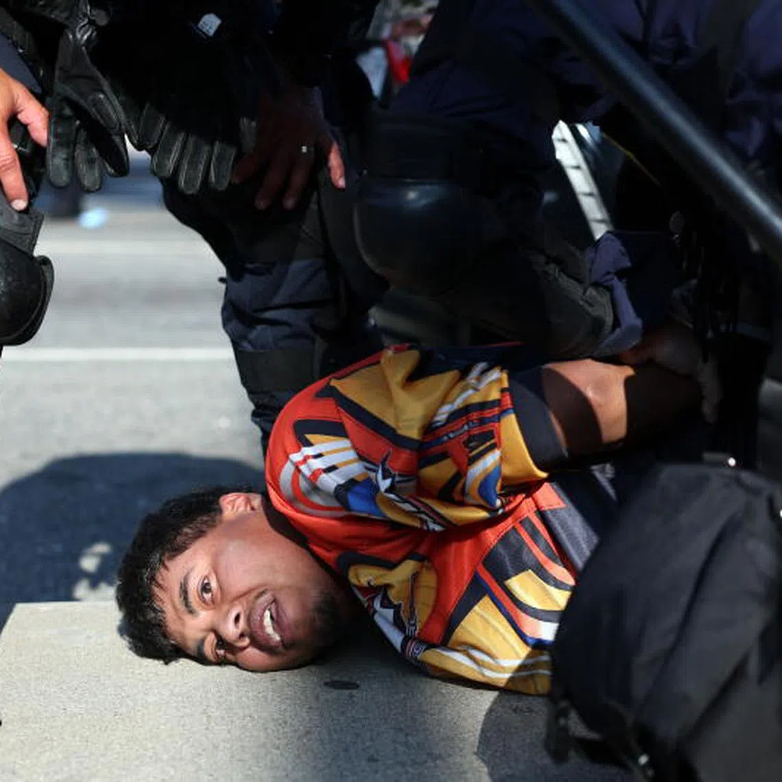 Caption:
epa12217112 (FILE) A protester is arrested during protests sparked by immigration raids in Los Angeles, California, USA, 10 June 2025 (reissued 05 July 2025). ​Since US President Donald Trump took office in January 2025, his administration has launched a mass deportation campaign — the largest in U.S. history — restoring and expanding controversial immigration policies. According to data from US Immigration and Customs Enforcement (ICE) and Syracuse University’s Transactional Records Access Clearinghouse (TRAC), as of 15 June 2025, more than 56,000 immigrants were in ICE detention — the highest number since 2019 — with 71.7 percent of them having no criminal record. The sharp increase in detentions, up from 39,000 in January 2025, particularly of non-criminal migrants, has triggered major protests in cities such as Los Angeles and New York. EPA/ALLISON DINNER