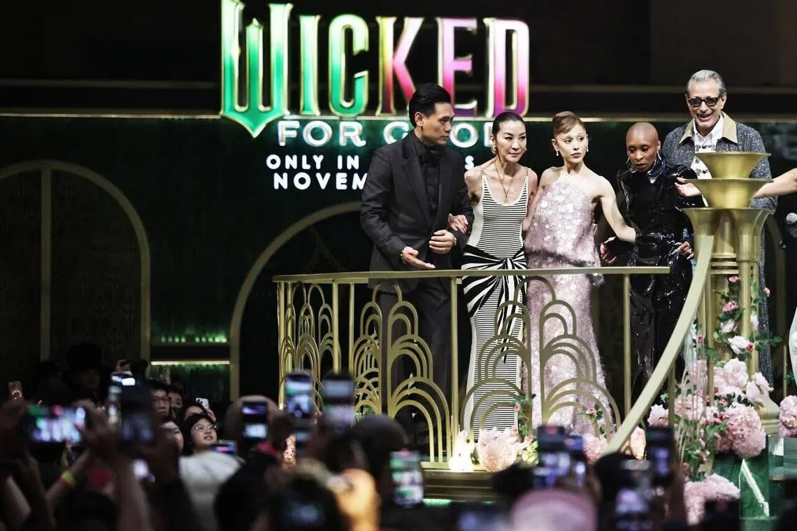 (From left) Wicked: For Good director Jon M. Chu and cast members Michelle Yeoh, Ariana Grande, Cynthia Erivo and Jeff Goldblum at a fan meet at Resorts World Sentosa's Weave mall on Nov 13.