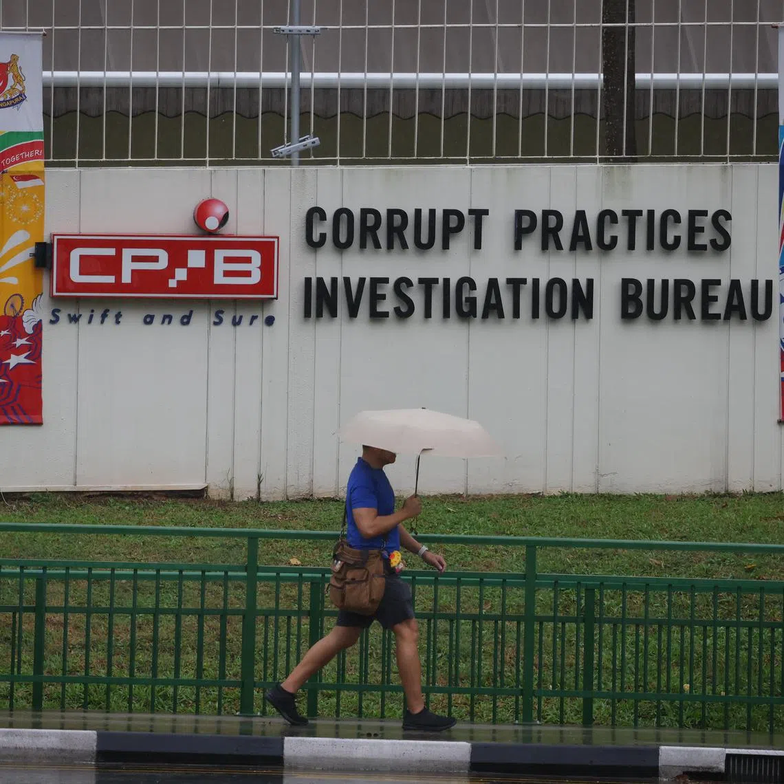 pixgeneric ST20230719_202338521131 Ong Wee Jin / 

Generic photo of a person walking past the Corrupt Practices Investigation Bureau (CPIB), photographed on July 19, 2023.



