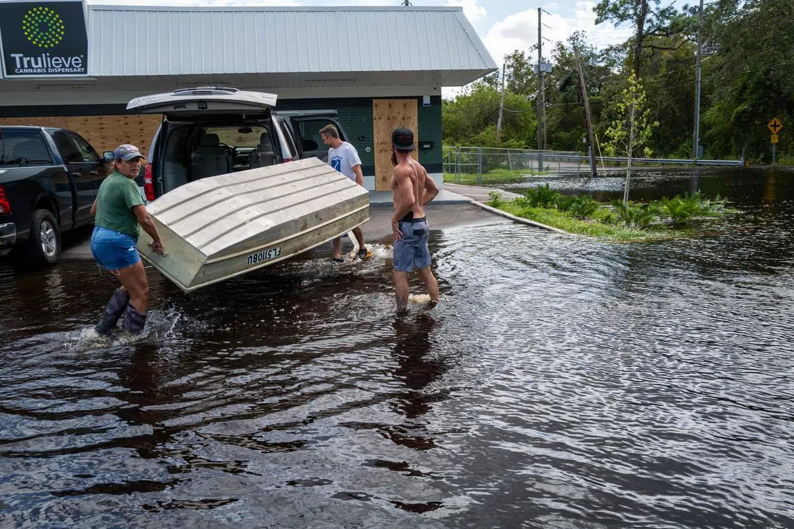 Millions of Floridians began a long and difficult recovery on Oct 11 after the state’s second major hurricane in two weeks.