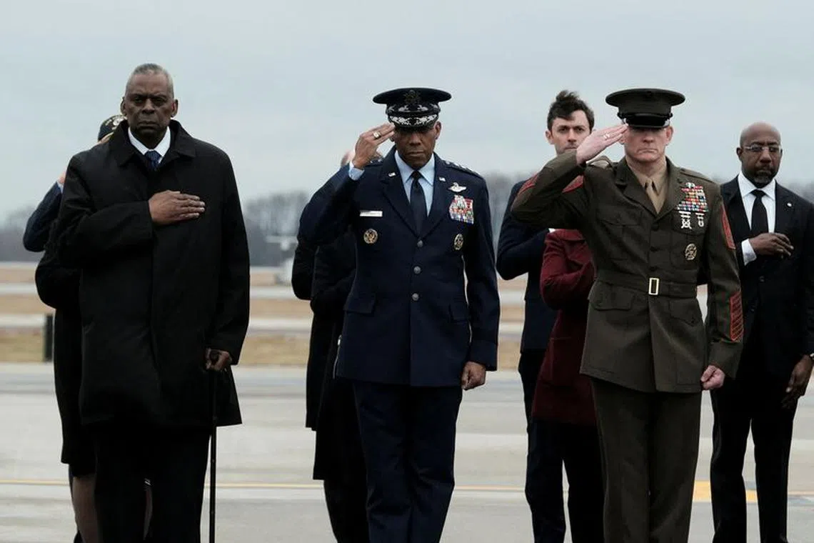 FILE PHOTO: Secretary of Defense Lloyd J. Austin, Gen. Charles \"CQ\" Brown and Sergeant Major Troy E. Black attend the dignified transfer of the remains of Army Reserve Sergeants William Rivers, Kennedy Sanders and Breonna Moffett, three U.S. service members who were killed in Jordan during a drone attack carried out by Iran-backed militants, at Dover Air Force Base in Dover, Delaware, U.S., February 2, 2024.  REUTERS/Michael A. McCoy/File Photo