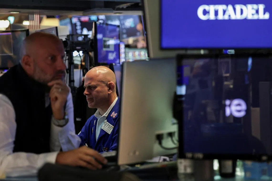 Traders working on the floor of the New York Stock Exchange, in New York City, on Sept 4.
