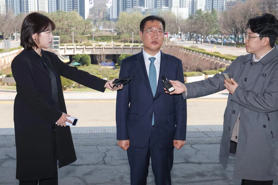 South Korean Justice Minister Park Sung-jae (centre) was impeached in December by Parliament.