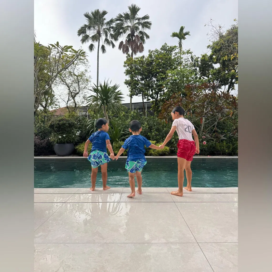 The writer's six-year-old son (far right), affectionately nicknamed Pogi, with his three-year-old twin brothers. 
