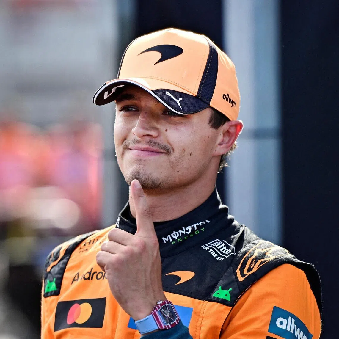 McLaren’s Lando Norris celebrates after qualifying in pole position  for the Hungarian Grand Prix.