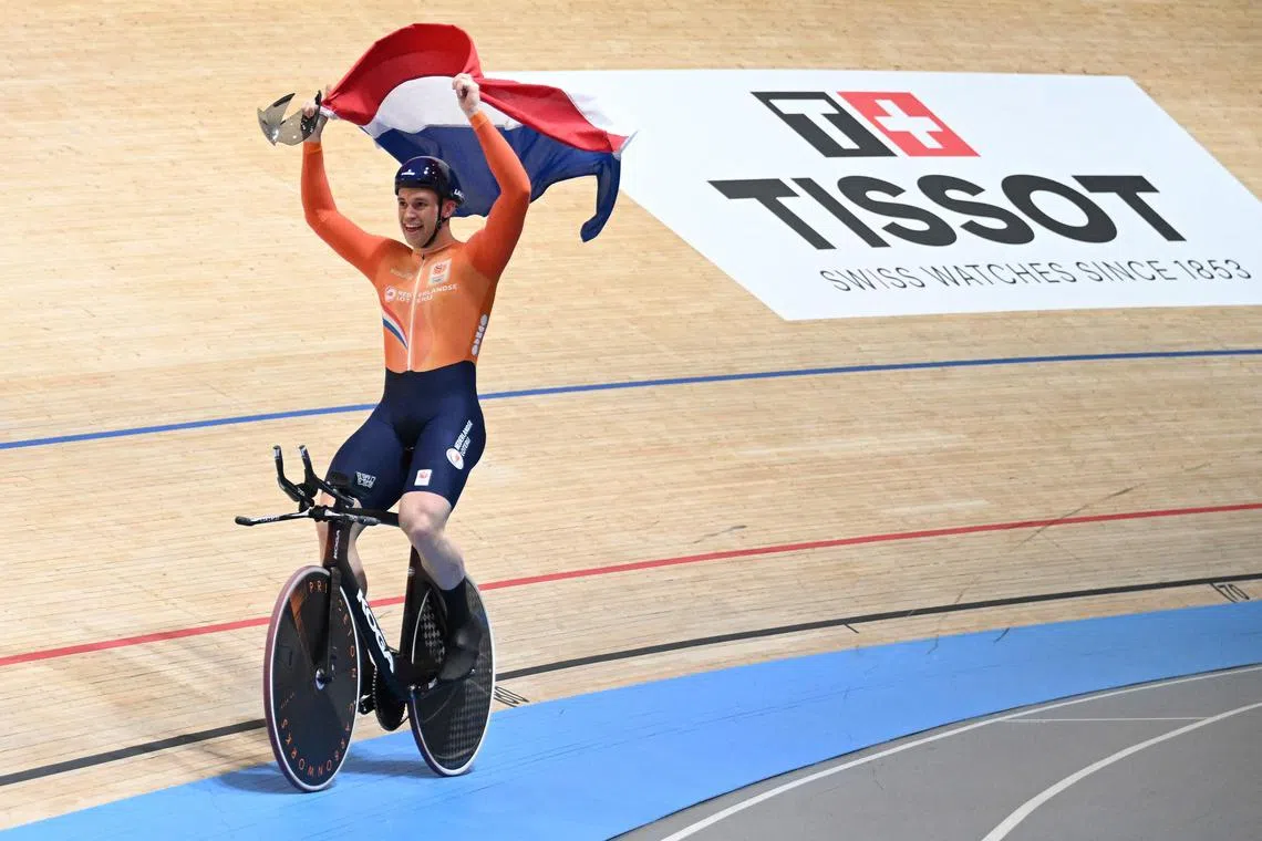Netherlands’ Harrie Lavreysen celebrates winning the men's 1km time trial final of the UCI Track Cycling World Championships in Ballerup, Denmark, on Oct 18.