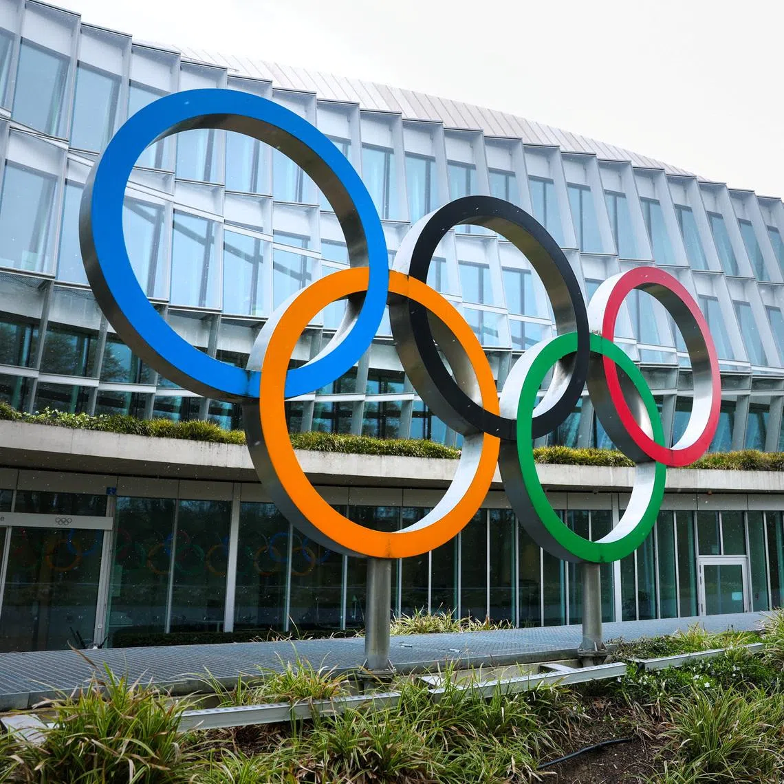 Olympic rings are pictured outside the International Olympic Committee (IOC) during an Executive Board meeting at the Olympic House in Lausanne, Switzerland, March 26, 2026. REUTERS/Denis Balibouse