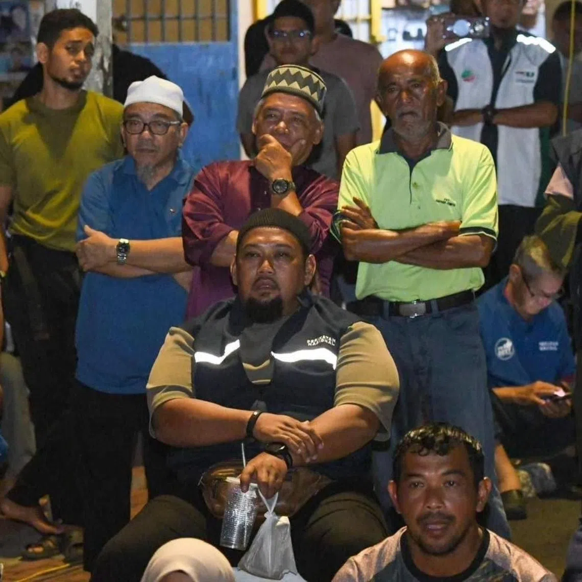 Perikatan Nasional supporters listening to Kedah Menteri Besar Sanusi Md Nor campaigning in Jempol, Negeri Sembilan on July 23, 2026.