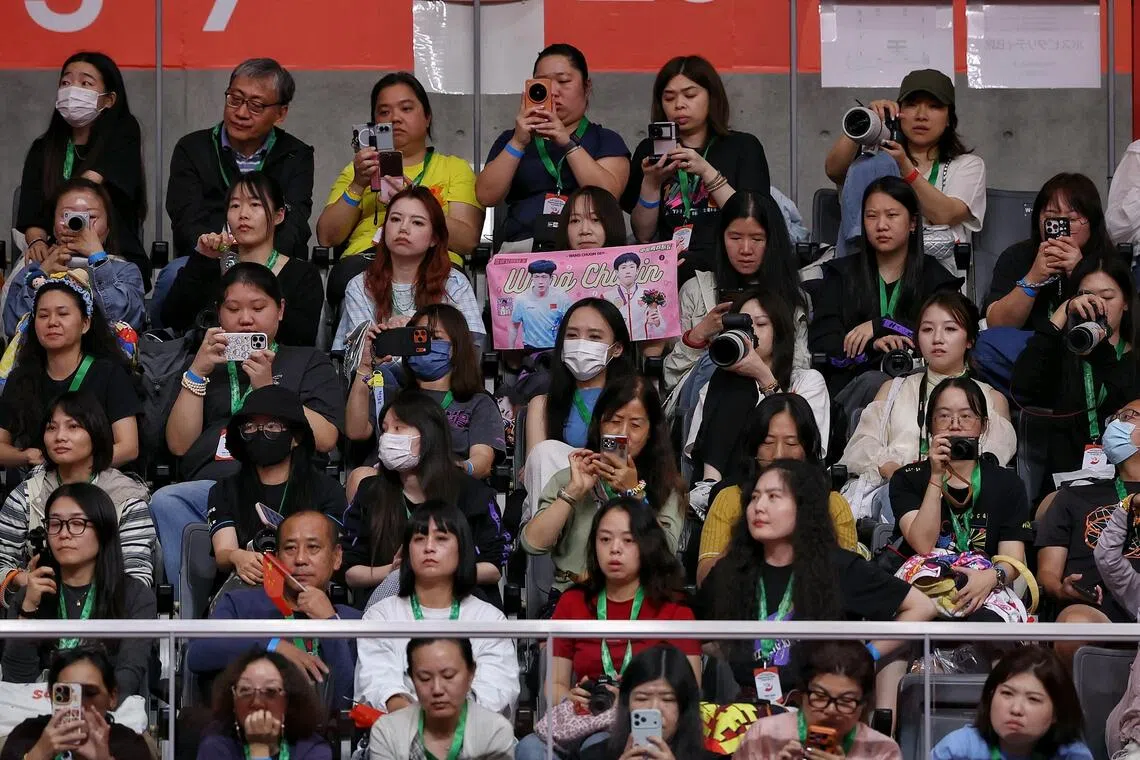 Chinese table tennis fans of Wang Chuqin watching him compete during the Aichi-Nagoya 2026 Asian Games table tennis men’s singles finals at Sky Hall Toyota.