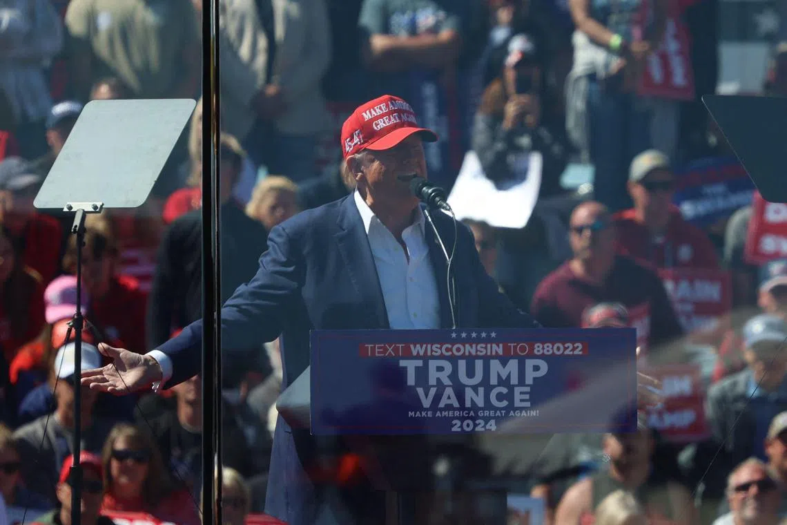 Former US president and Republican presidential candidate Donald Trump speaking during a rally at the Central Wisconsin Airport in Mosinee, Wisconsin, on Sept 7. 
