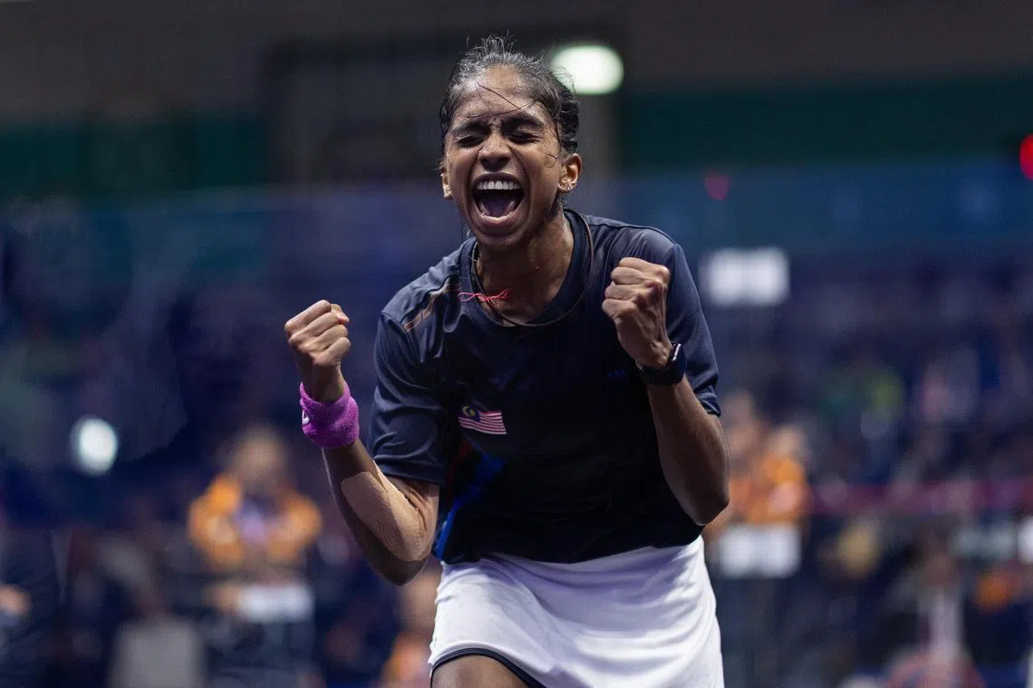 Malaysian squash player Sivasangari Subramaniam celebrating after winning the women's singles gold medal at the Asian Games. She beat Hong Kong’s Chan Sin Yuk 3-2 in the final on Thursday. 
