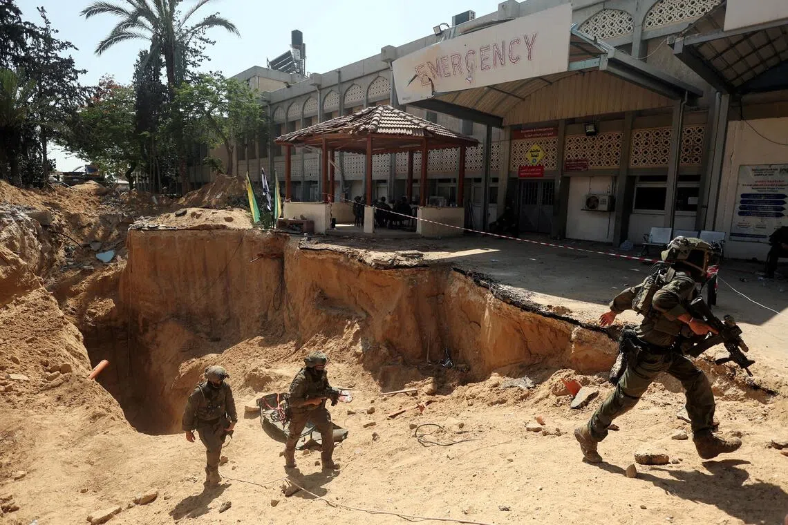 Israeli soldiers walking out from a tunnel underneath the European Hospital in Khan Younis in the Gaza Strip on June 8. 