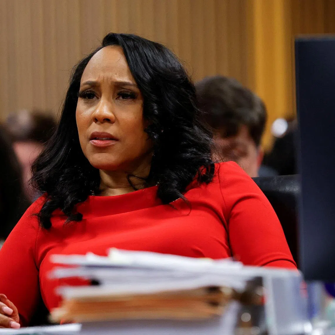 FILE PHOTO: Fulton County District Attorney Fani Willis attends a hearing on the Georgia election interference case, March 1, 2024, in Atlanta, Georgia, U.S. Alex Slitz/Pool via REUTERS/File Photo