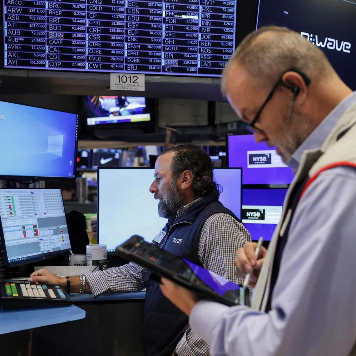 Traders working on the floor of the New York Stock Exchange, in New York City, on Oct 30.