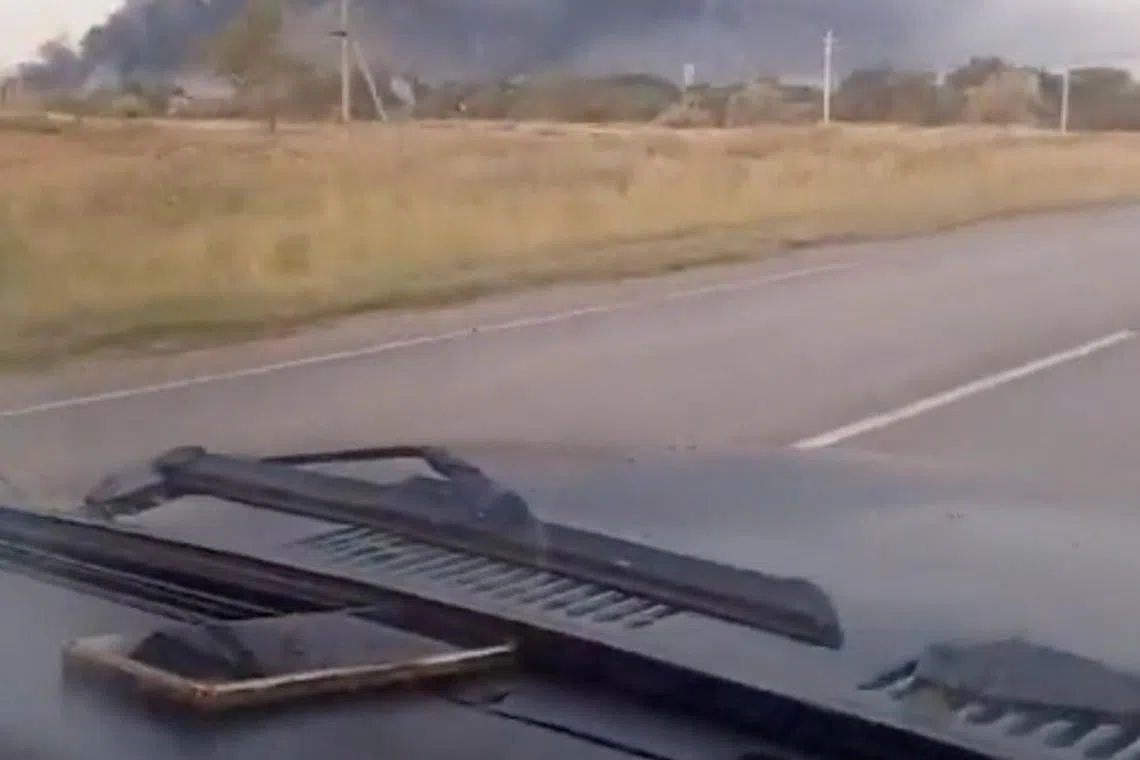 Smoke rises from a military facility following a drone attack, in Oktyabrsky, Volgograd Region, Russia, August 22, 2024 in this screengrab taken from a social media video. Social Media/via REUTERS