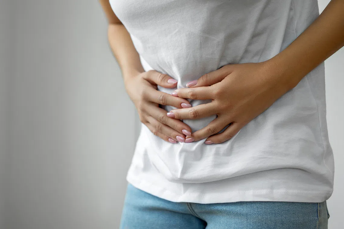 Post-infection irritable bowel syndrome causes recurrent abdominal pain or discomfort along with diarrhoea or constipation, or both, following an acute gut infection.