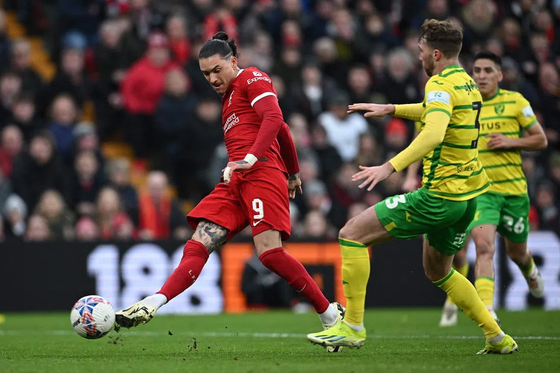 Liverpool's Uruguayan striker Darwin Nunez scoring the team's second goal during their FA Cup fourth-round win over Norwich City at Anfield on Jan 28.