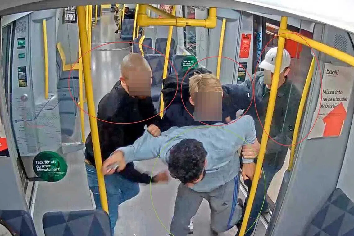 Three of the four men beat a man on a subway train. 