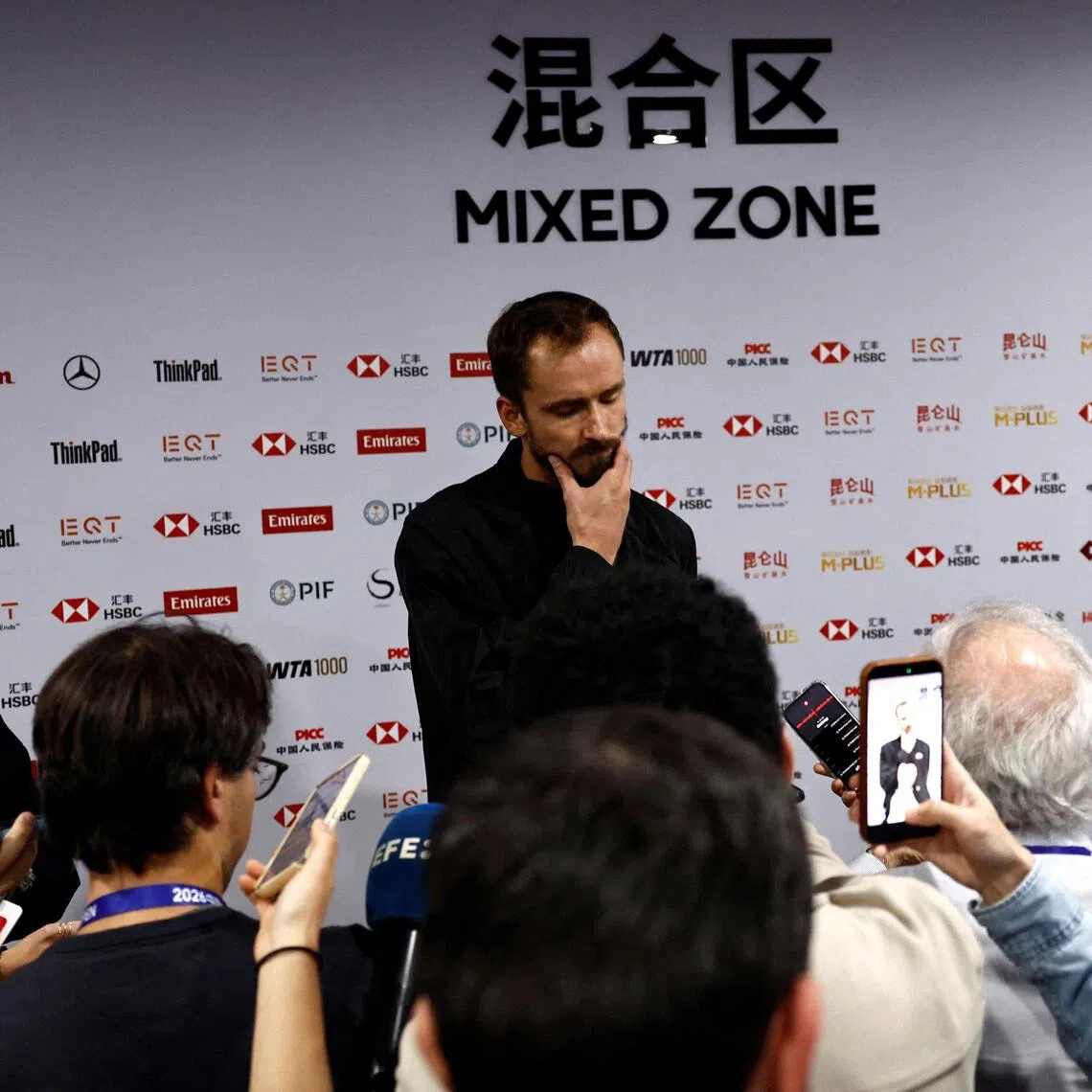 A downcast Russian Daniil Medvedev speaking to the media after being disqualified from his China Open semi-final against Serbia’s Novak Djokovic on Oct 5.