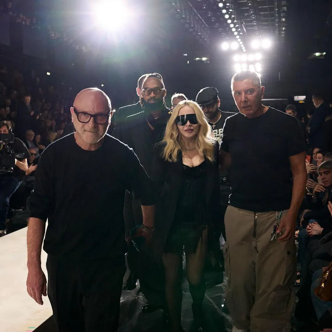 Madonna (centre) with Domenico Dolce (left) and Stefano Gabbana (right) during the Dolce & Gabbana Fall/Winter 2026/2027 fashion show at the Fashion Week in Milan on Feb 28.