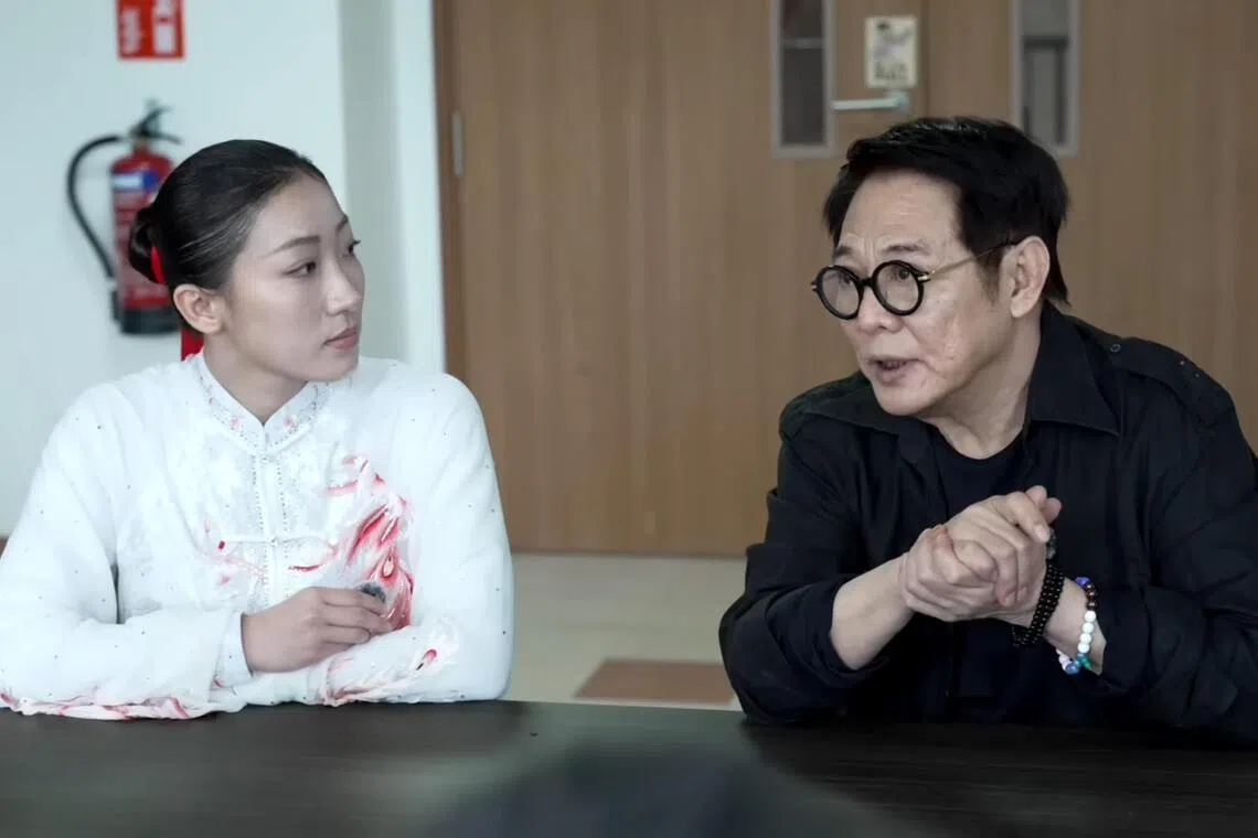 dlwushu30 - Videograb. Wushu master and Hollywood star Jet Li (right) interacts with Singapore wushu athlete Zeanne Law at the Singapore Wushu Dragon & Lion Dance Federation Secretariat during a filming session for the inaugural World Taijiquan Day on March 21. The 20-year-old went on to win two golds at the World Taijiquan Championships in April.