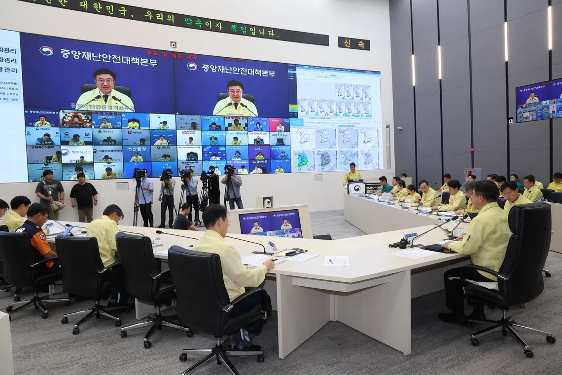 Interior and Safety Minister Yun Ho-jung (on screen) offers an apology during a disaster response meeting on Sept 29.