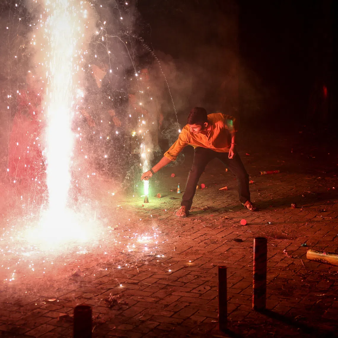During Diwali, widespread bursting of firecrackers adds to the already high pollution levels in Delhi.
