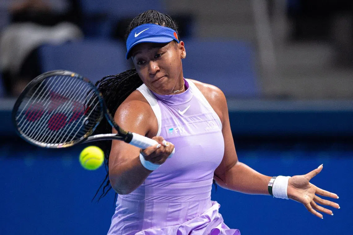 Naomi Osaka of Japan hitting a return against Australian Daria Saville at the Pan Pacific Open in Tokyo.
