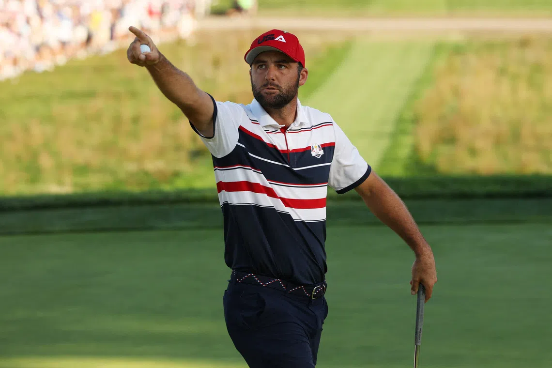 FILE PHOTO: Golf - The 2025 Ryder Cup - Bethpage Black Golf Course, Farmingdale, New York, United States - September 28, 2025 Team USA's Scottie Scheffler celebrates after holing his putt on the 17th hole during the singles REUTERS/Brendan Mcdermid/ File Photo